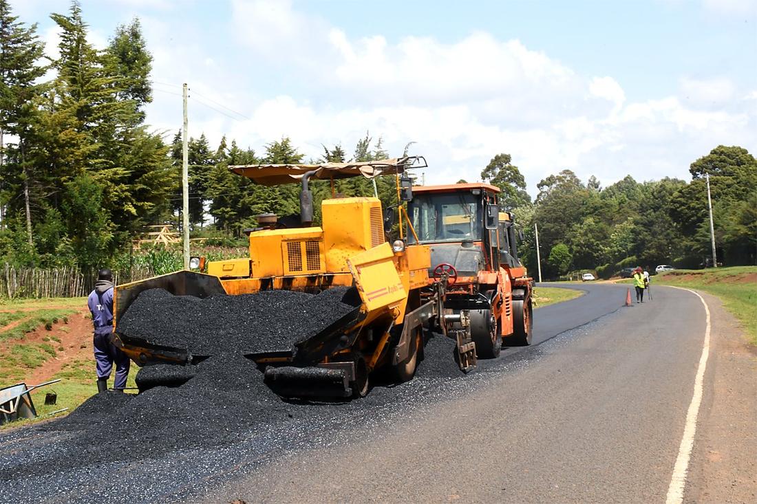Fresh asphalt being laid